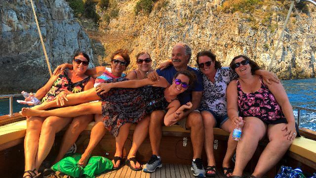 Relaxing and taking in the scenic views on the private boat ride to Positano on the Amalfi Coast.